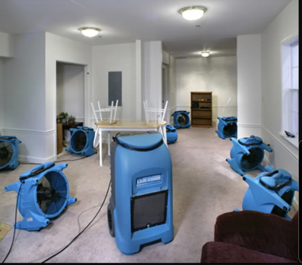Air movers and dehumidifier setup for Water Damage Restoration in New Ulm